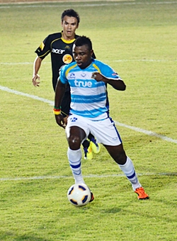Pattaya United’s Cameroon import Paul Ekollo (32) is seen in action in a Thai Premier League fixture against Army United last season.